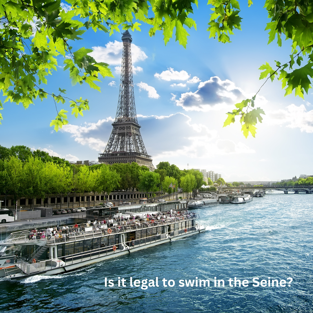 The river seine with waterboats and the Eiffel tower in the background